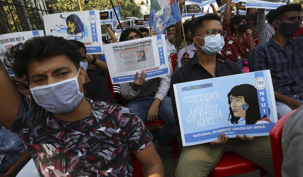 Students hold placards demanding the release of Indian climate activist Disha Ravi, during a protest in Bangalore, India, on Tuesday. Ravi, 22, was arrested on Saturday for circulating a document on social media supporting months of massive protests by farmers. Photo: AP