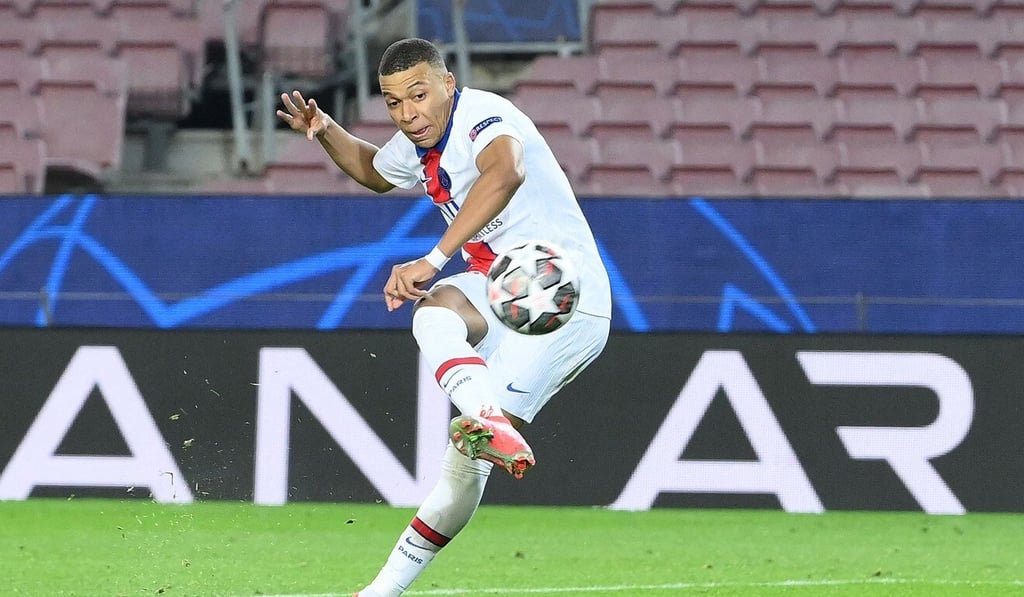 Paris Saint-Germain’s Kylian Mbappe scores against FC Barcelona in their Uefa Champions League round of 16 first leg match at Camp Nou. Photo: AFP