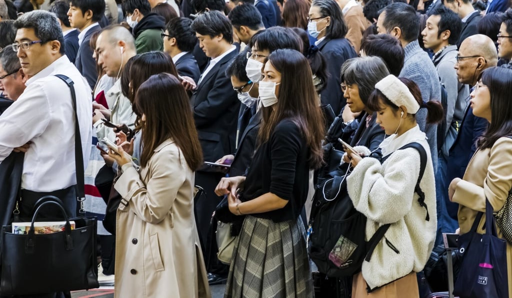 More Japanese are using credit cards and electronic money for small purchases, according to a survey. Photo: Getty Images