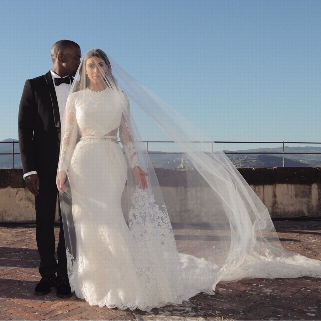 Kim Kardashian and Kanye West pose for a wedding photo. Photo: Instagram