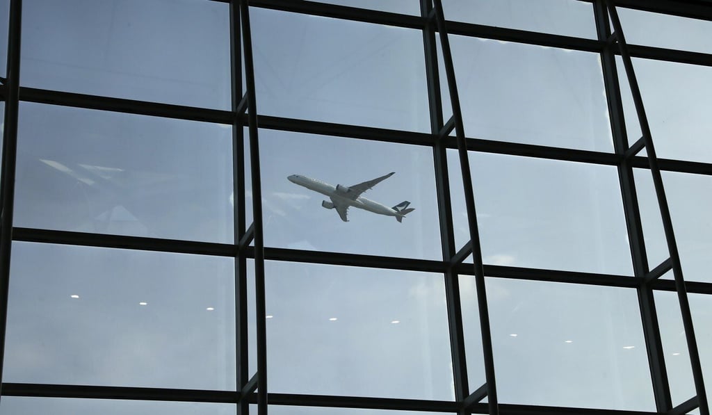 A Cathay Pacific flight leaves Hong Kong International Airport. Photo: K.Y. Cheng A Cathay Pacific flight leaves Hong Kong International Airport. Photo: K.Y. Cheng
