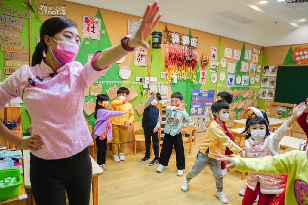 Children get back into the swing of things at Ling Liang Church Sau Tak Kindergarten in Lai Chi Kok. Photo: Sam Tsang