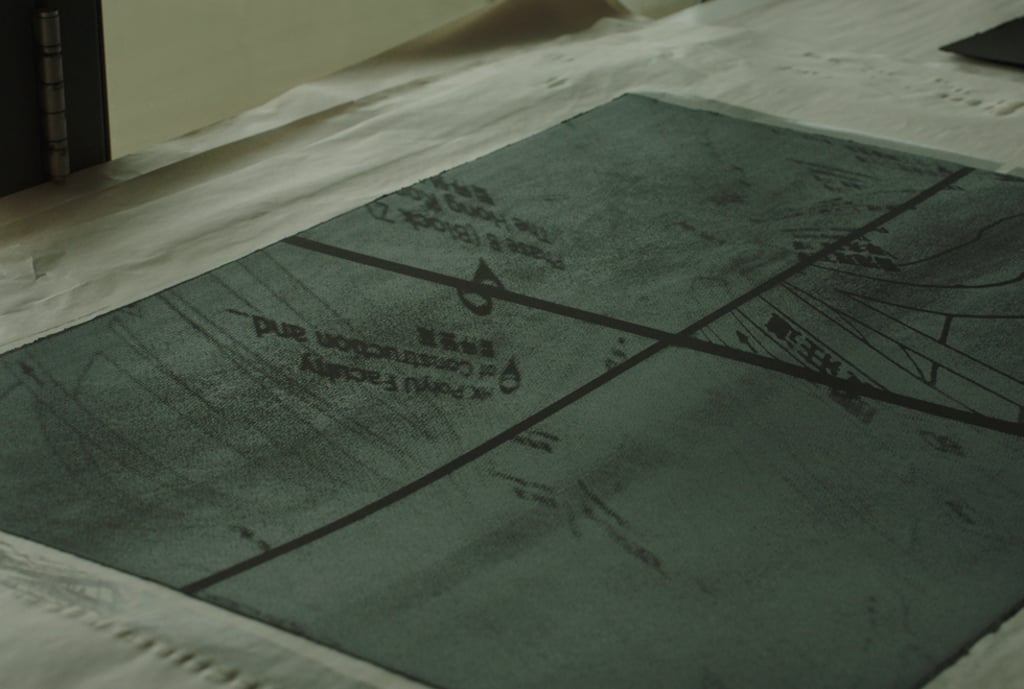 One of Yung’s lithographs from her Mapping series, freshly pulled from the printing press. One of Yung’s lithographs from her Mapping series, freshly pulled from the printing press.