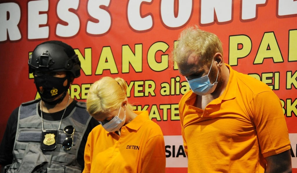 Andrey Kovalenko (right) with his girlfriend Ekaterina Trubkina in Bali on Wednesday. Photo: AFP