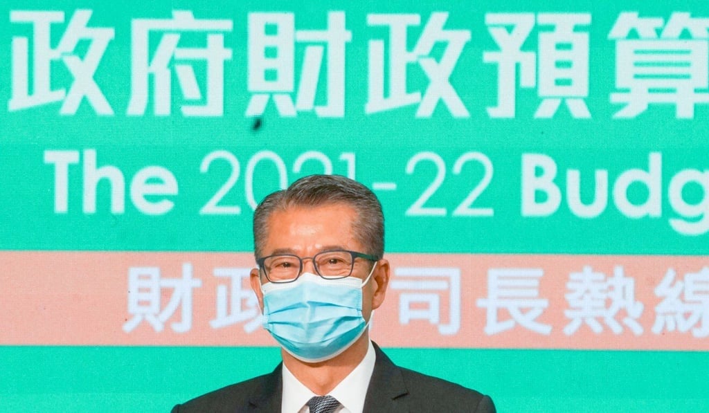 Financial Secretary Paul Chan attends a joint radio phone-in programme on Thursday. Photo: Felix Wong