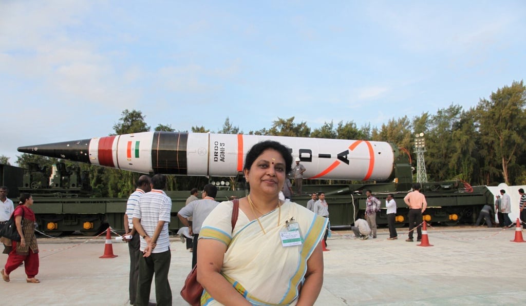 Tessy Thomas in front of one of the long-range nuclear-capable Agni missiles she helped design. Photo: Getty Images