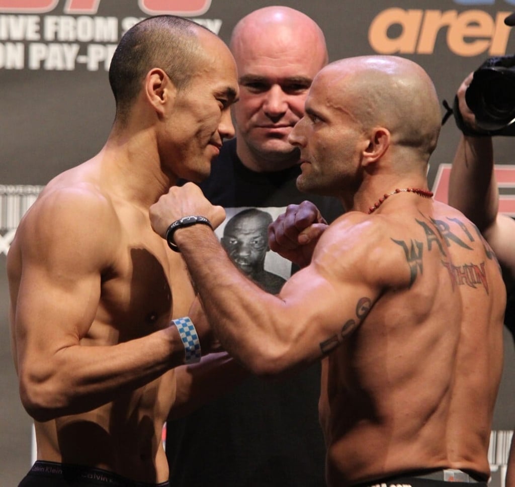 Featherweights Tiequan Zhang and Jason Reinhardt face off at the UFC 127 weigh-in. Photo: Josh Hedges/Zuffa LLC/Zuffa LLC via Getty Images Featherweights Tiequan Zhang and Jason Reinhardt face off at the UFC 127 weigh-in. Photo: Josh Hedges/Zuffa LLC/Zuffa LLC via Getty Images