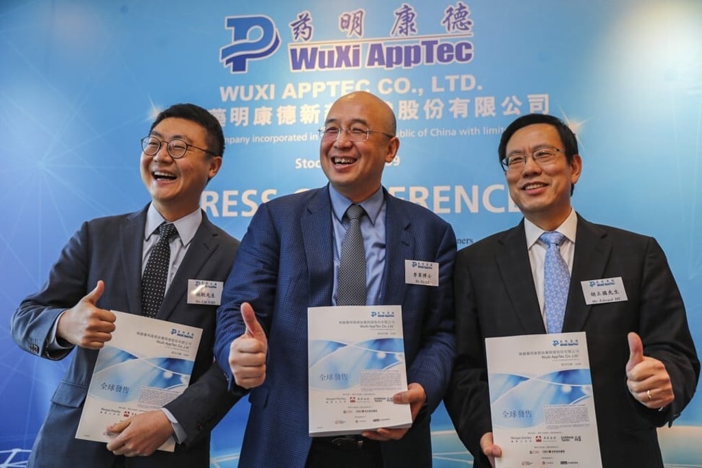 WuXiAppTec’s senior management during the company’s initial public offering press conference in Hong Kong on November 30, 2018. (L-R): Board secretary Chi Yao, chairman and chief executive Dr. Ge Li and chief financial officer Edward Hu. Photo: Edward Wong