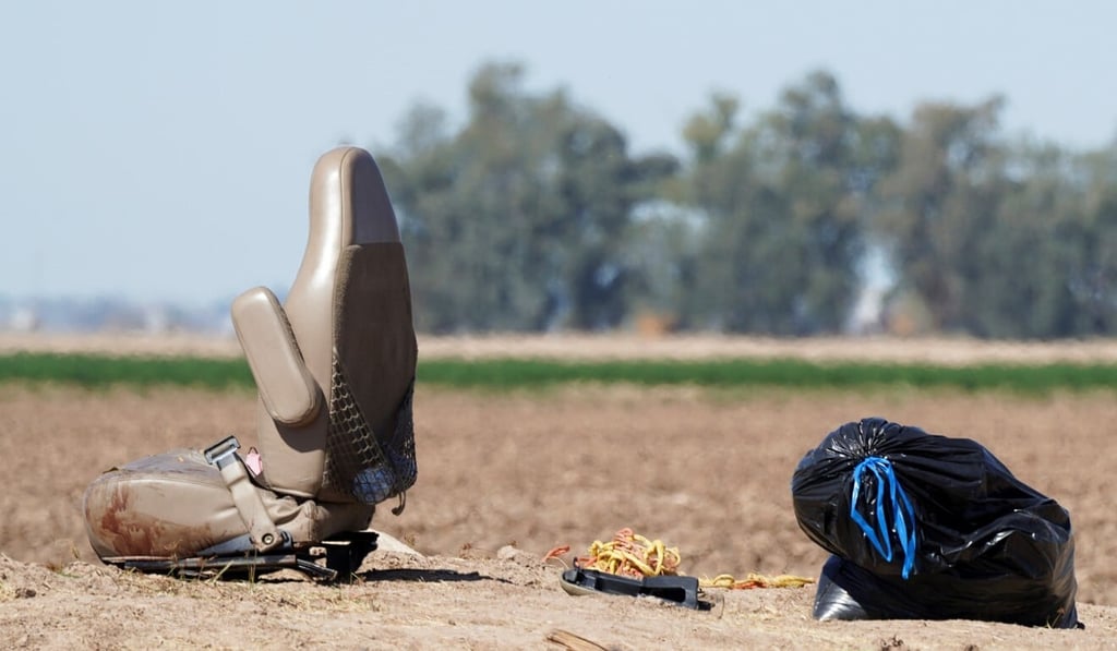A car seat is seen at the scene of a collision between a truck and an SUV near Holtville, California, on Tuesday. Photo: Reuters