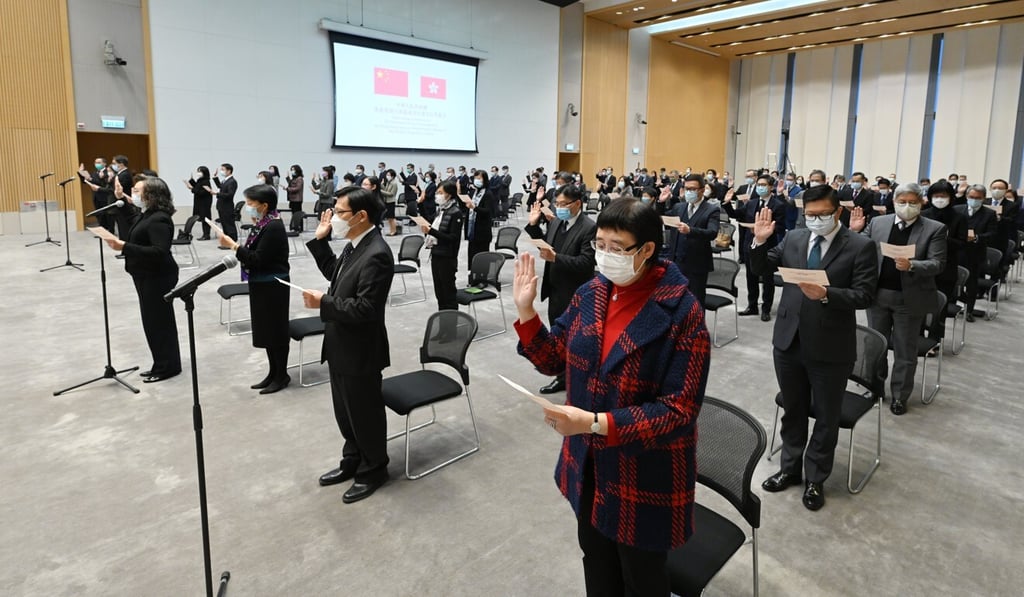 Senior officials pledge allegiance to the city during a ceremony in December. Photo: Handout Senior officials pledge allegiance to the city during a ceremony in December. Photo: Handout