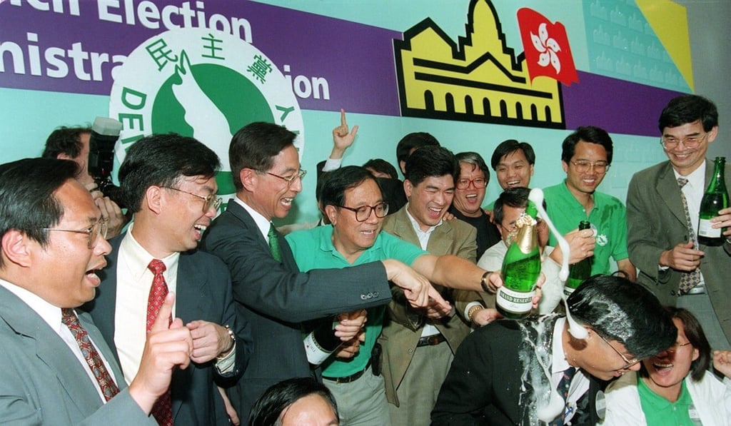 Members of the Democratic Party celebrate after winning seats in the first Legco elections in Hong Kong, in 1998. Photo: Robert Ng