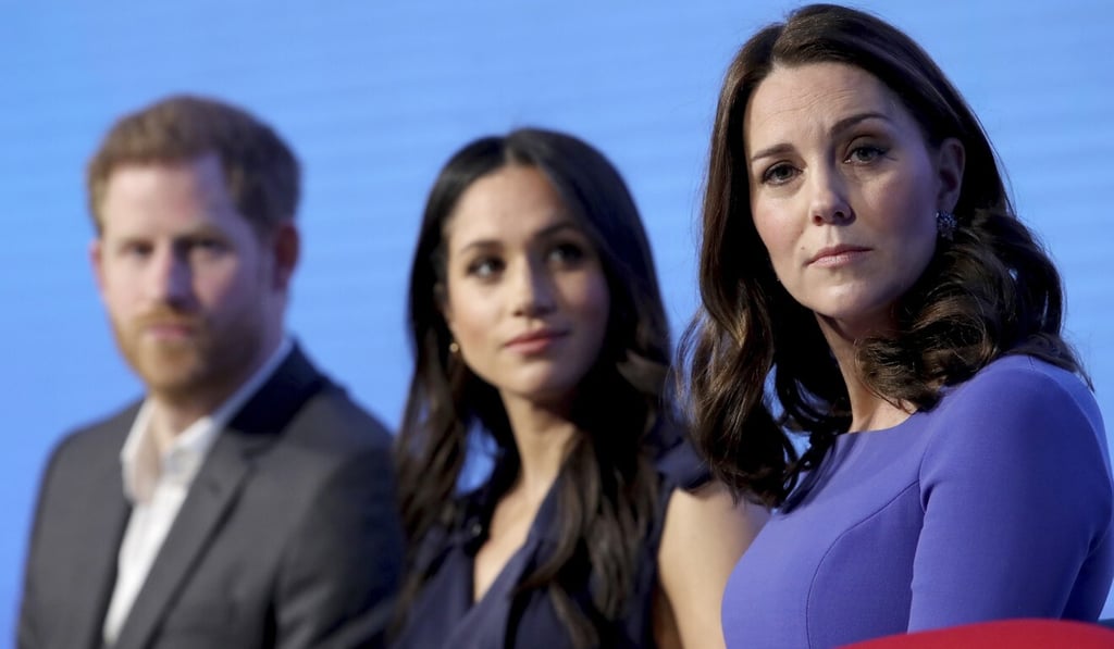 Harry, Meghan and Kate pictured at an event in 2018. Meghan was the subject of numerous unfavourable media comparisons with her sister-in-law. Photo: AP Harry, Meghan and Kate pictured at an event in 2018. Meghan was the subject of numerous unfavourable media comparisons with her sister-in-law. Photo: AP