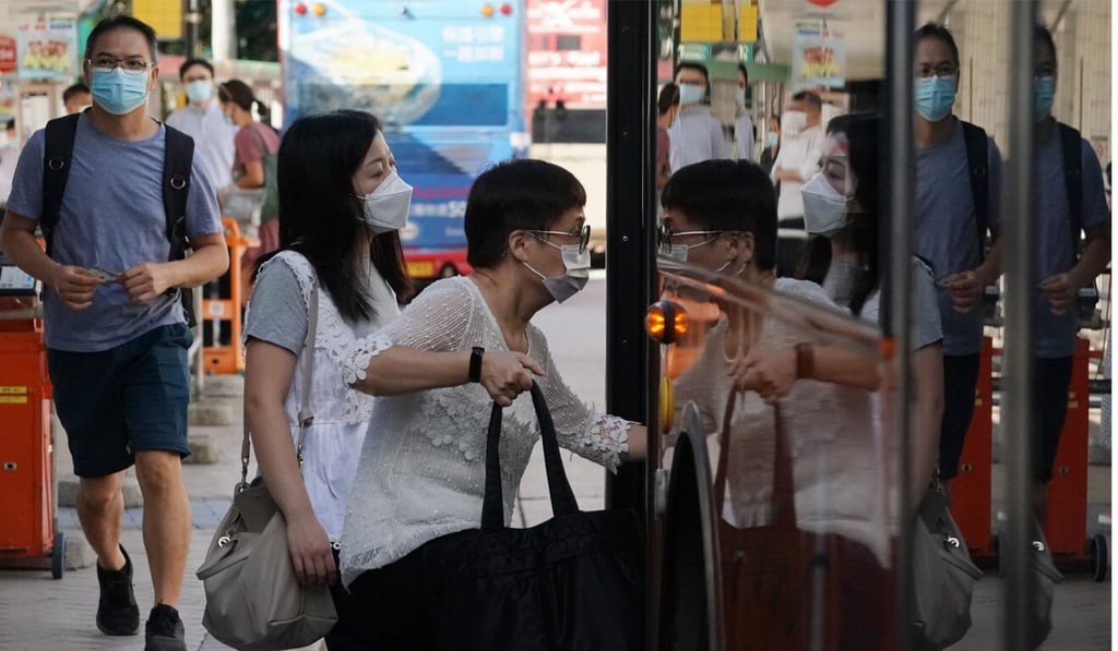 Passengers in face masks board the bus at the Cross Harbour Tunnel Toll Plaza station in Hung Hom. Photo: Felix Wong Passengers in face masks board the bus at the Cross Harbour Tunnel Toll Plaza station in Hung Hom. Photo: Felix Wong
