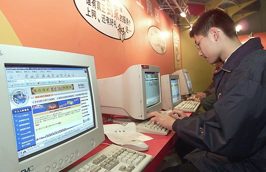 Internet users visit Chinese websites at an internet service provider's booth during a computer fair in Beijing on January 27, 2000, eight months before China announced sweeping measures to control the internet. Internet users visit Chinese websites at an internet service provider's booth during a computer fair in Beijing on January 27, 2000, eight months before China announced sweeping measures to control the internet.
