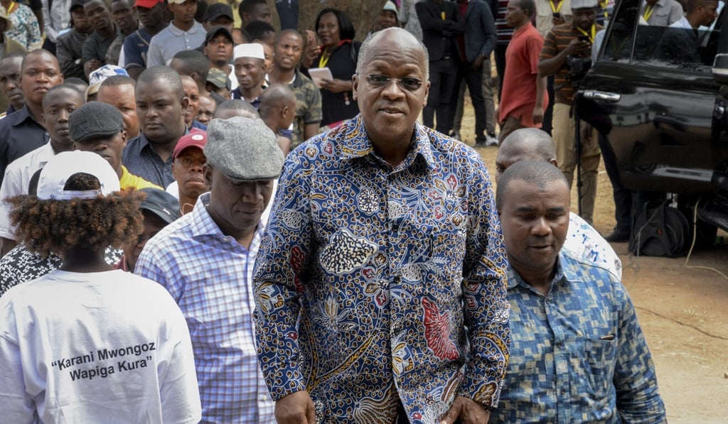 Tanzania's President John Magufuli stands in line to cast his vote in the presidential election in October 2020. Photo: AP
