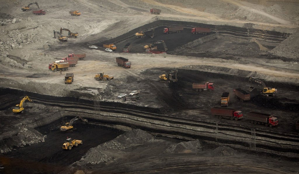 Vehicles work at an open-pit coal mine near Ordos. Inner Mongolia is China’s second largest coal-producing region. Photo: AP Vehicles work at an open-pit coal mine near Ordos. Inner Mongolia is China’s second largest coal-producing region. Photo: AP
