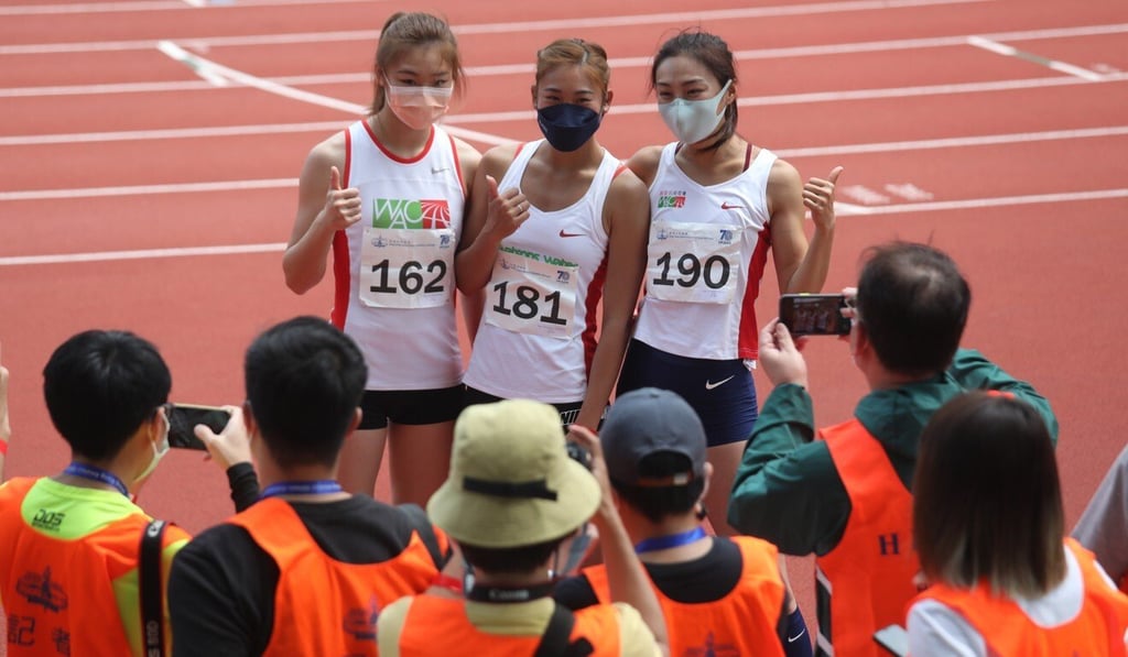 High jump winner Tiffany Tang (centre) stands on the podium at the preseason trial at Siu Sai Wan Sports Ground. Photo: Xiaomei Chen High jump winner Tiffany Tang (centre) stands on the podium at the preseason trial at Siu Sai Wan Sports Ground. Photo: Xiaomei Chen