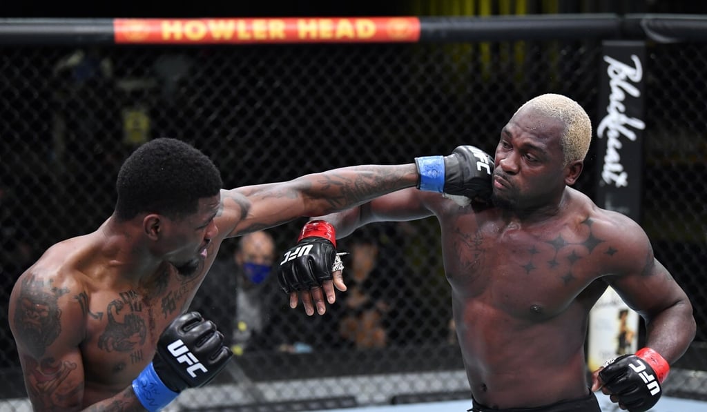 Kevin Holland punches Derek Brunson.
