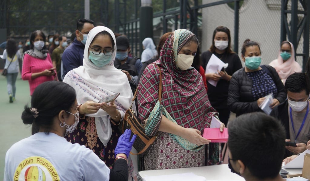 The Zubin Foundation distributes relief items, including masks, to members of the ethnic minority communities in Hong Kong. Photo: Handout The Zubin Foundation distributes relief items, including masks, to members of the ethnic minority communities in Hong Kong. Photo: Handout