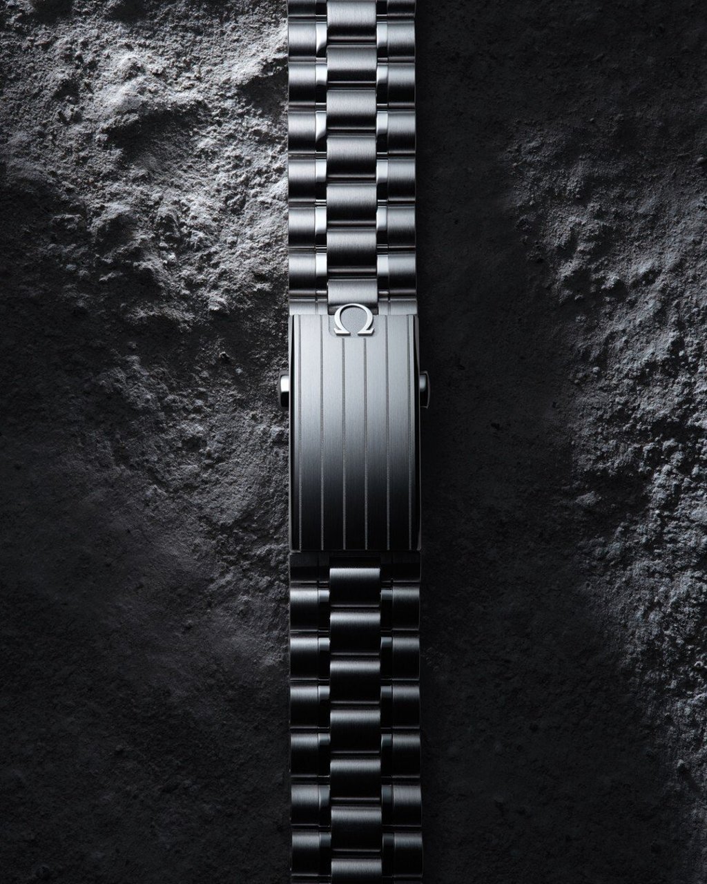 Design changes on the updated watch include a satin-finished clasp cover sporting a polished Omega logo. Photo: Omega