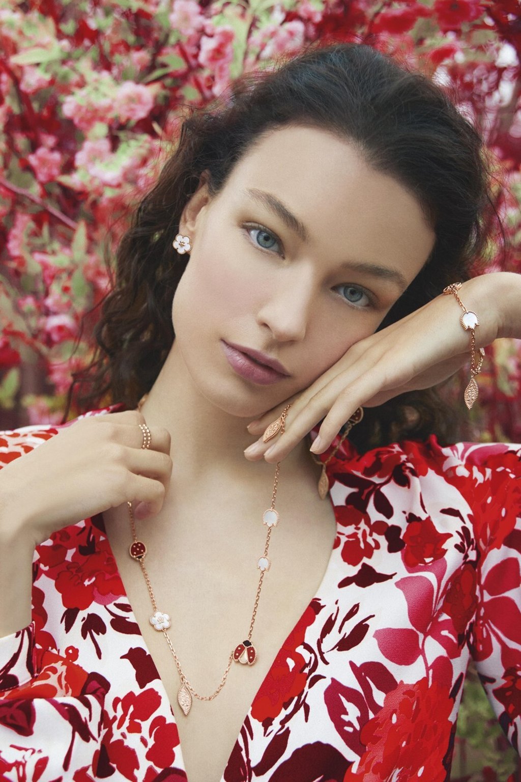 The Lucky Spring long necklace and matching bracelet feature motifs of ladybugs, plum blossoms and lily of the valley leaves and bells set on a rose gold chain. Photo: Erik Madigan Heck The Lucky Spring long necklace and matching bracelet feature motifs of ladybugs, plum blossoms and lily of the valley leaves and bells set on a rose gold chain. Photo: Erik Madigan Heck