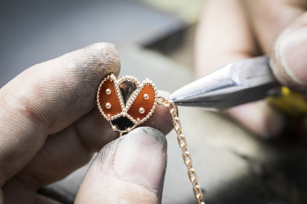 The maison’s signature beaded gold is created by hand, one bead at a time. Photo: Van Cleef & Arpels The maison’s signature beaded gold is created by hand, one bead at a time. Photo: Van Cleef & Arpels
