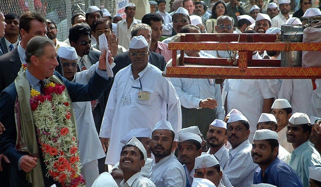 Britain’s Prince Charles met Mumbai’s ‘dabbawallas’ during a visit to the city in 2003. Photo: EPA Britain’s Prince Charles met Mumbai’s ‘dabbawallas’ during a visit to the city in 2003. Photo: EPA