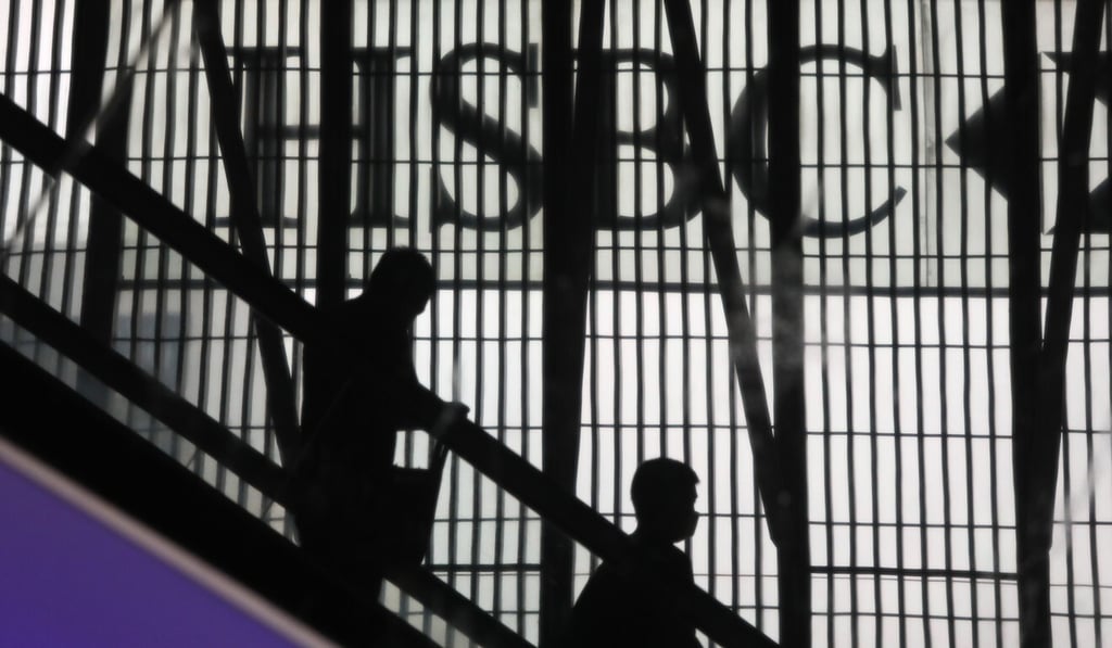 People descend the escalator at banking giant HSBC in Hong Kong’s Central district. Exports and investment drove the city’s first-quarter growth. Photo: K.Y. Cheng People descend the escalator at banking giant HSBC in Hong Kong’s Central district. Exports and investment drove the city’s first-quarter growth. Photo: K.Y. Cheng