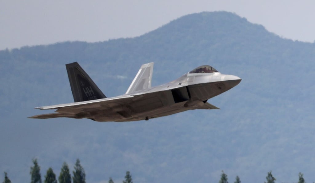 Honeywell was fined US$13 million for sharing technical information about US fighter jets, like the F-22. Photo: AFP Honeywell was fined US$13 million for sharing technical information about US fighter jets, like the F-22. Photo: AFP