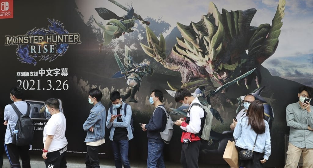 Buyers lining up outside Golden Computer Arcade in Hong Kong’s Sham Shui Po on March 26, the first day of release for the video game Monster Hunter Rise on Nintendo Switch. Photo: Edmond So