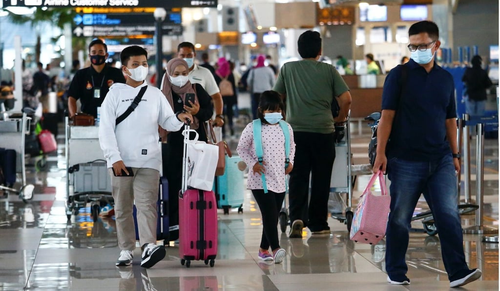 Travellers at Soekarno-Hatta Airport in Indonesia prepare to return to their hometowns, an activity known locally as ‘mudik’. Photo: Reuters