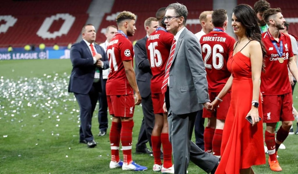 Liverpool owner John W Henry and his wife Linda Petruzzi on the Wanda Metropolitano pitch after their Champions League triumph in Madrid. Photo: Reuters Liverpool owner John W Henry and his wife Linda Petruzzi on the Wanda Metropolitano pitch after their Champions League triumph in Madrid. Photo: Reuters