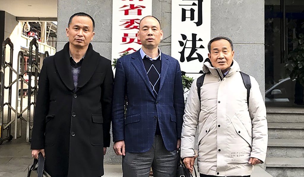 Lu Siwei (centre) was also barred from leaving the mainland when he wanted to attend a legal forum in Hong Kong at the start of 2020. Photo: Handout