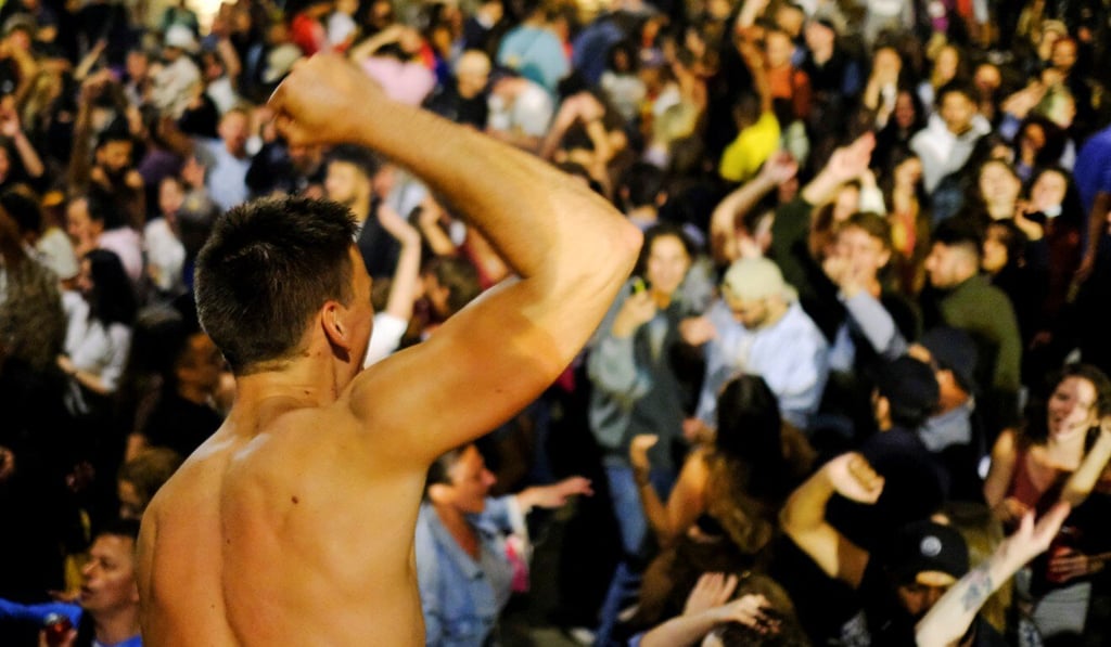 People drink and dance in Barcelona. Photo: Reuters