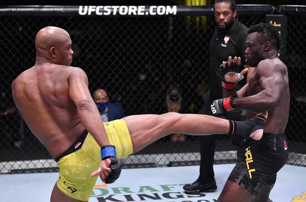 Anderson Silva kicks Uriah Hall.