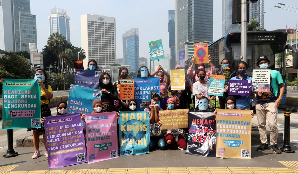 Environmental activists gather during a rally to mark Earth Day in Jakarta last month. Photo: EPA