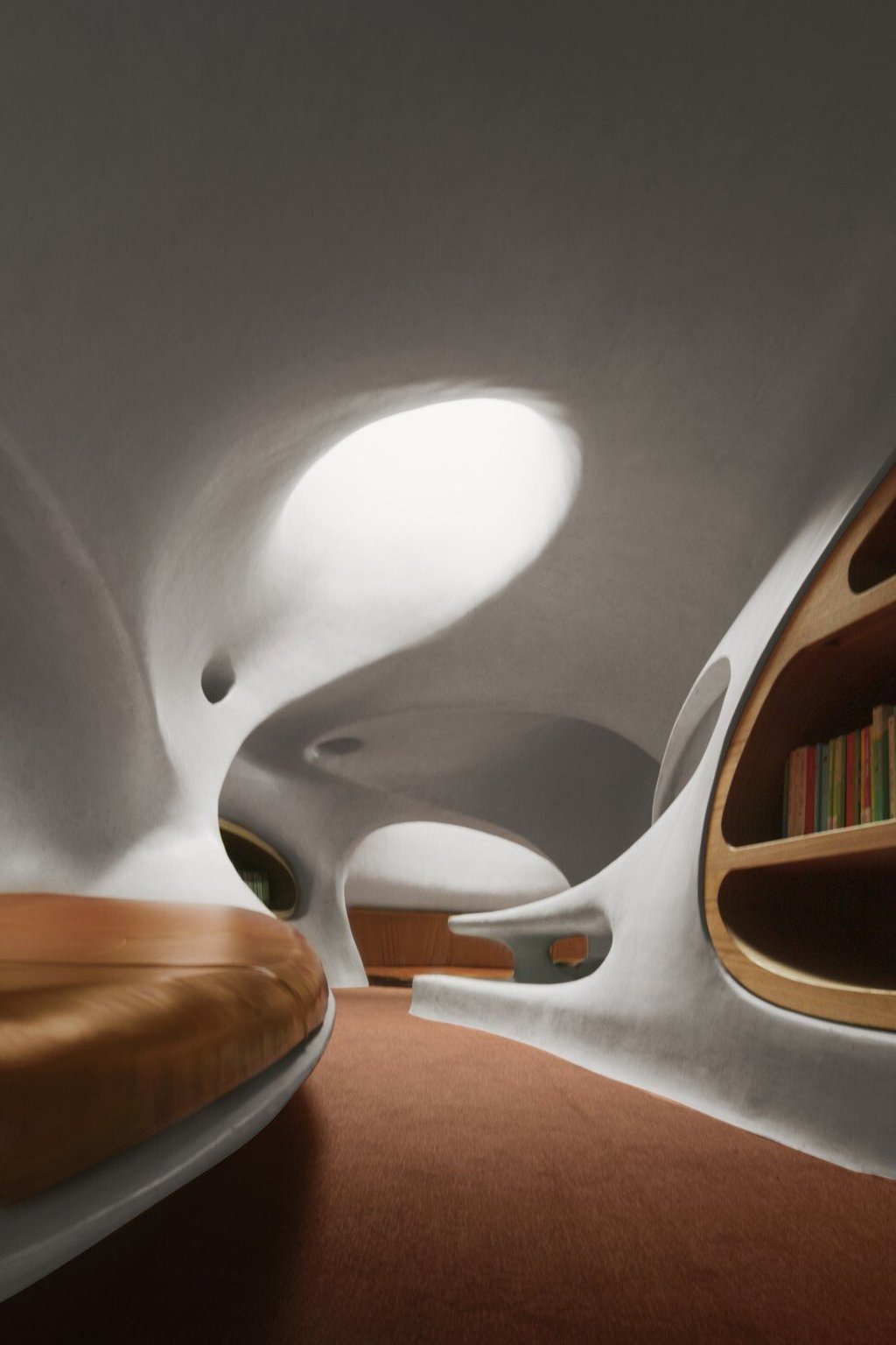 The many perforations in the Cloudscape of Haikou allow visitors to see sea and sky through the library.