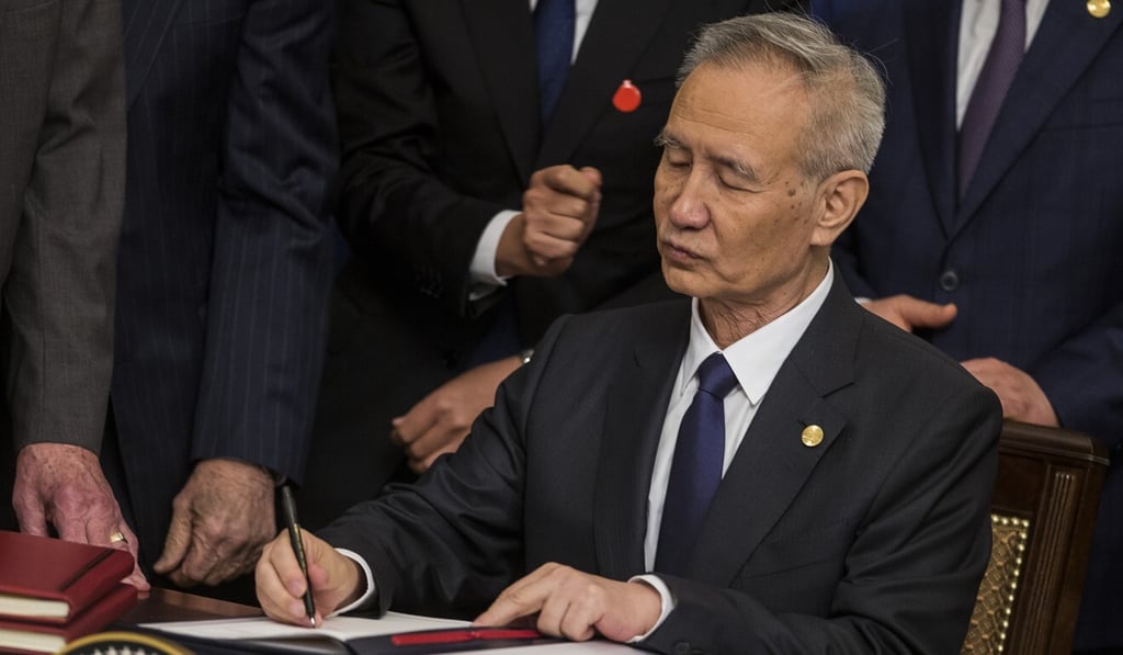 Liu He, China's vice-premier, signs the US-China “phase-one” trade agreement during a ceremony with president Donald Trump in Washington, US, on January 15, 2020. Photo: Bloomberg