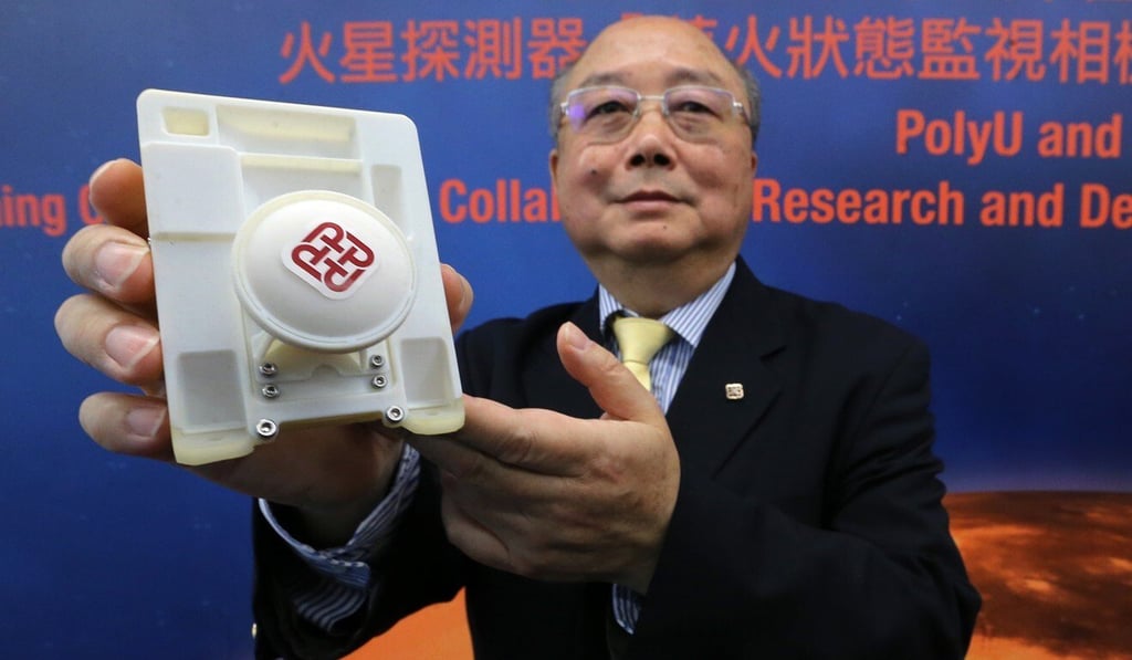 Professor Yung Kai-leung with a model of the Mars camera at Polytechnic University. Photo: Dickson Lee