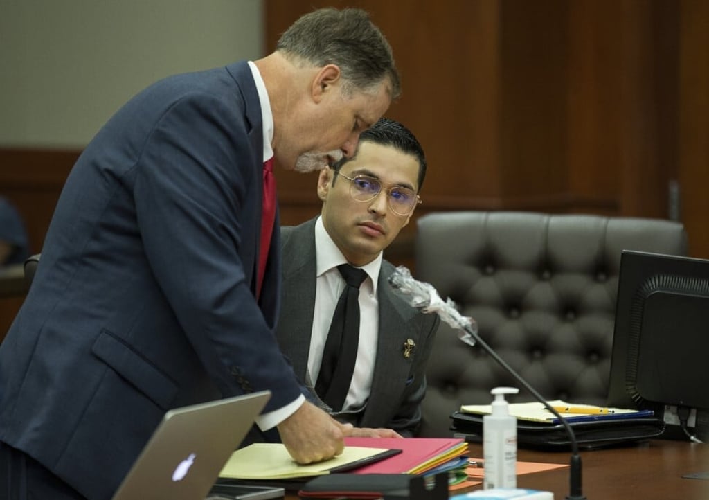 Victor Hugo Cuevas, right, and his lawyer Michael Elliott at Fort Bend County Justice Centre in Richmond, Texas on Friday. Photo: Houston Chronicle via AP