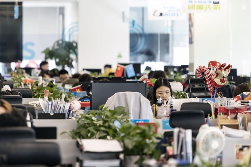 Employees work at Hellobike’s headquarters in Shanghai on Monday, April 26, 2021. Chinese bike-sharing giant Hello has confidentially filed for a US initial public offering, according to people familiar with the matter, joining a wave of technology firms seeking to take advantage of surging valuations to sell shares. Photo: Bloomberg Employees work at Hellobike’s headquarters in Shanghai on Monday, April 26, 2021. Chinese bike-sharing giant Hello has confidentially filed for a US initial public offering, according to people familiar with the matter, joining a wave of technology firms seeking to take advantage of surging valuations to sell shares. Photo: Bloomberg