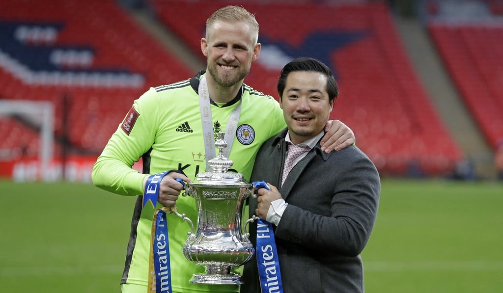 Leicester City’s chairman Aiyawatt Srivaddhanaprabha and goalkeeper Kasper Schmeichel with the FA Cup after the club’s win against Chelsea. Photo: AFP Leicester City’s chairman Aiyawatt Srivaddhanaprabha and goalkeeper Kasper Schmeichel with the FA Cup after the club’s win against Chelsea. Photo: AFP