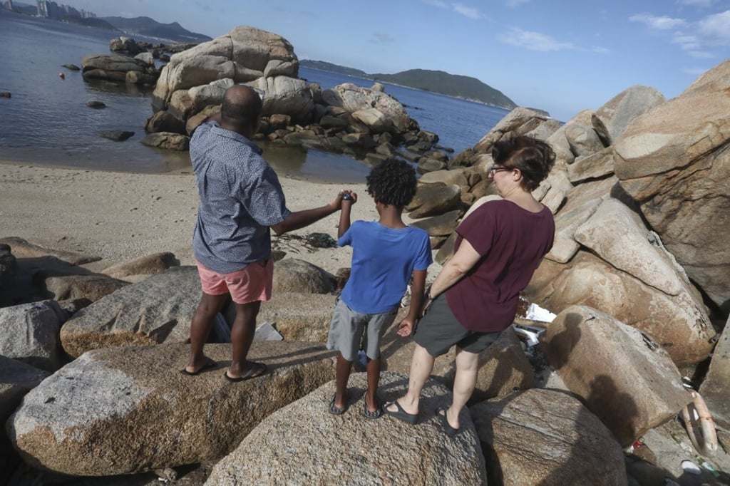 Prosper, their 10-year-old son and Arndt near their home in Shek O, Hong Kong. Photo: Jonathan Wong Prosper, their 10-year-old son and Arndt near their home in Shek O, Hong Kong. Photo: Jonathan Wong