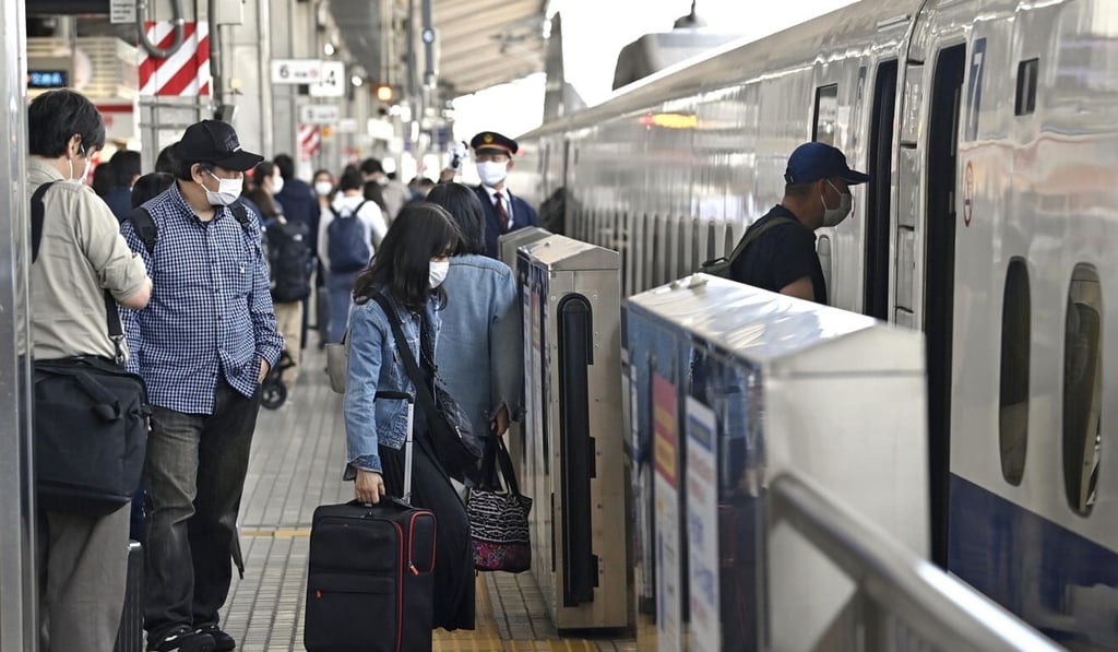 Passengers board a Tokaido Shinkansen bullet train at JR Nagoya Station on May 4. Photo: Kyodo Passengers board a Tokaido Shinkansen bullet train at JR Nagoya Station on May 4. Photo: Kyodo