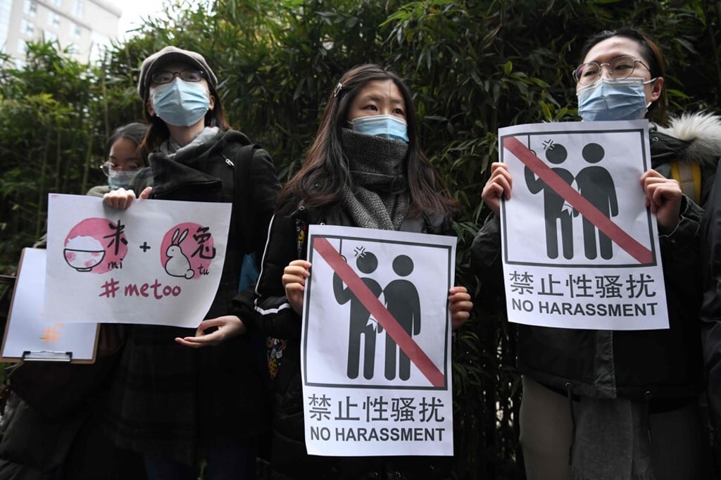 Supporters of Zhou Xiaoxuan display posters outside the Haidian District People’s Court in Beijing on December 2, 2020. Photo: AFP