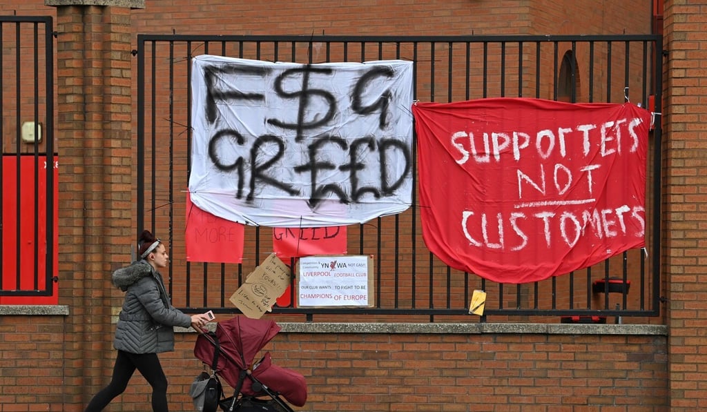 Banners critical of the European Super League project hang from the railings of Anfield. Photo: AFP Banners critical of the European Super League project hang from the railings of Anfield. Photo: AFP