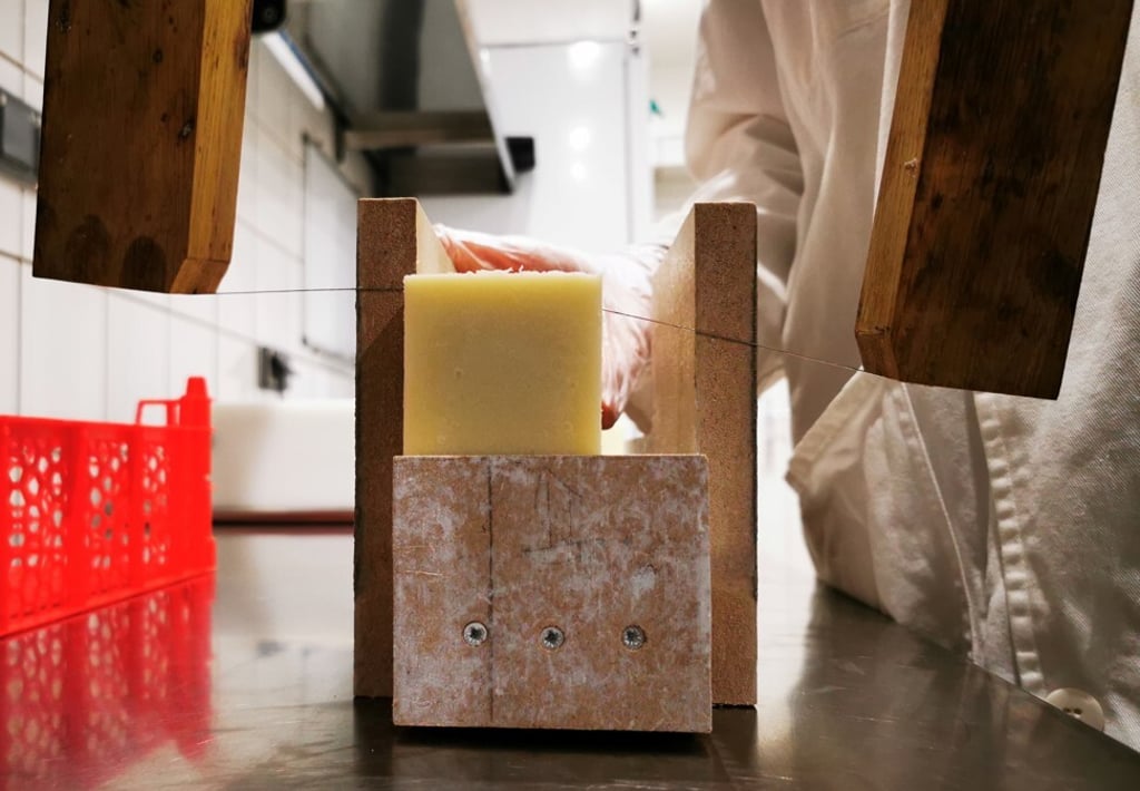 Desrocher cuts a block of snail slime soap into bars. Photo: Reuters/Ardee Napolitano Desrocher cuts a block of snail slime soap into bars. Photo: Reuters/Ardee Napolitano