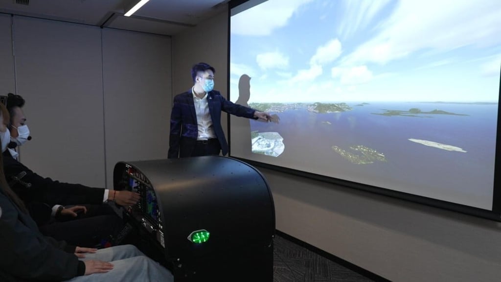 Tsang (centre) believes his technology can go a long way towards elevating safety standards in the aviation sector by helping pilots get a better understanding of their performance.