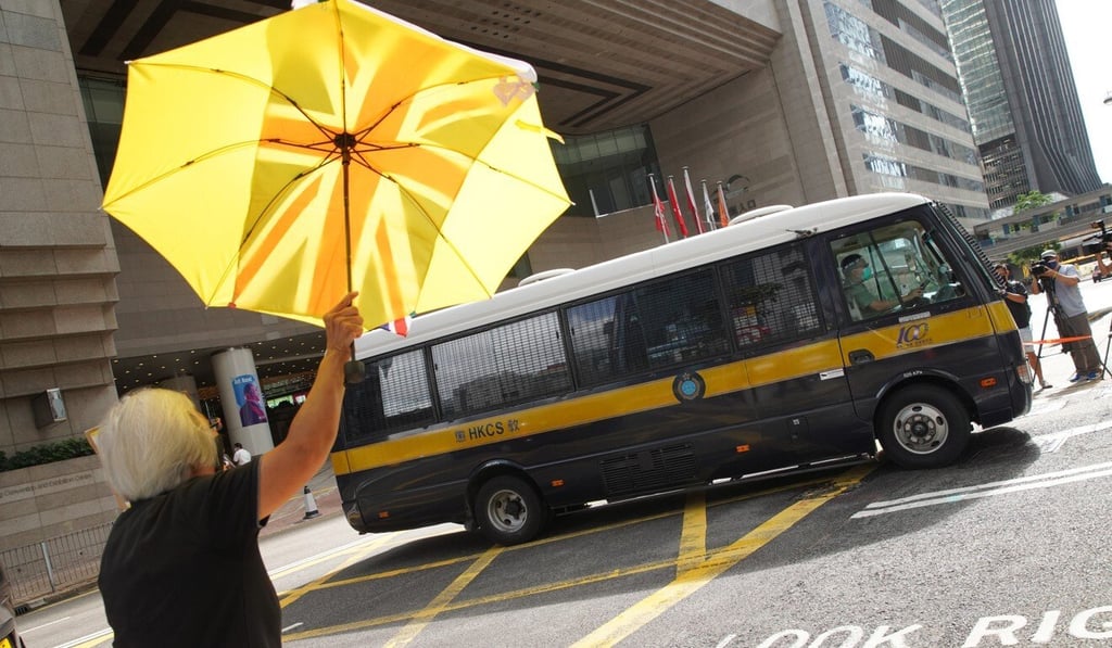The defendants are escorted away from court. Photo: Winson Wong The defendants are escorted away from court. Photo: Winson Wong