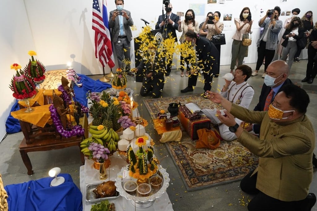 Thai and US officials take part in a ceremony to return two stolen hand-carved sandstone lintels in Los Angeles. Photo: AP